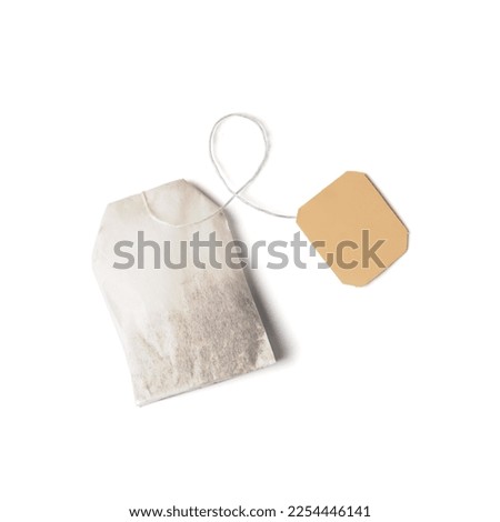 Rectangular tea bag with label isolated on white background top view.