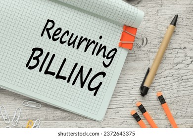 Recurring Billing open notepad with text on the corner of the page