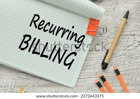 Recurring Billing open notepad with text on the corner of the page