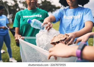 Recycle, plastic bag and ngo volunteer group cleaning outdoor park for sustainability. Nonprofit, recycling project and waste clean up in nature for earth day, climate change and community support - Powered by Shutterstock