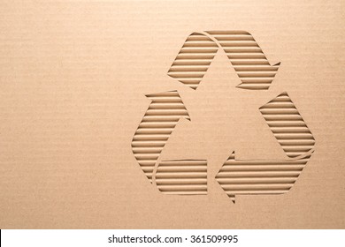 Recycle Sign On A Corrugated Cardboard 
