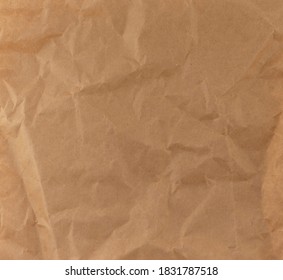 Recycled brown wrinkled paper Crumpled Old kraft paper abstract shape background - Shutterstock ID 1831787518