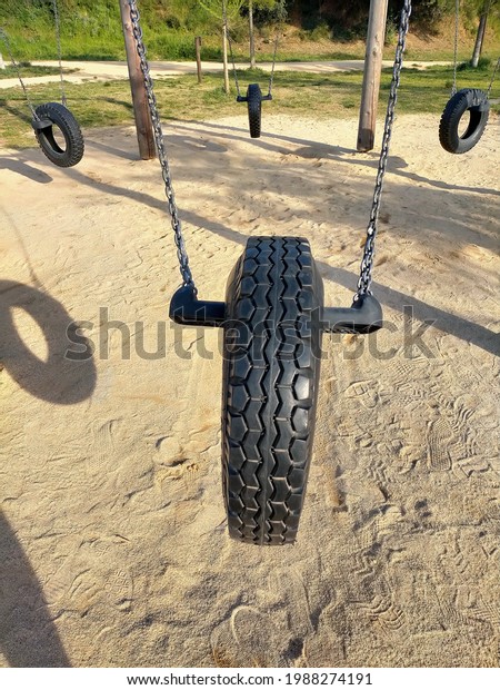Recycled car tire for a\
swing