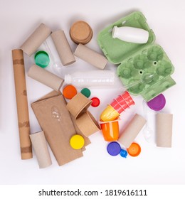 Recycled Craft Ideas For Kids, Use Of Toilet Paper Rolls And Other Materials For Creative Projects, Flat Lay, White Background, Top View