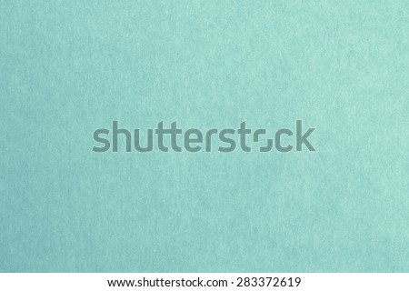 Recycled paper texture background in turquoise green blue mint vintage color