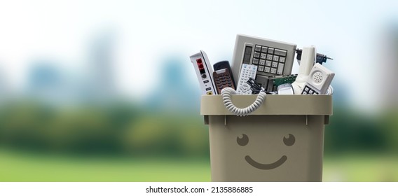 Recycling bin full of electronic waste, smiling cute character - Shutterstock ID 2135886885