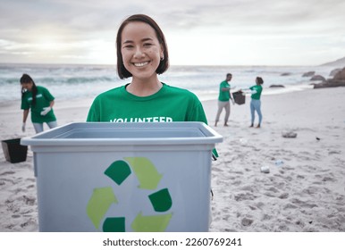 Recycling bin, portrait of Asian woman and volunteer at beach cleaning for environmental sustainability. Recycle, earth day and happy female ready to stop pollution by ocean for community service. - Powered by Shutterstock