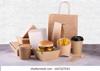 Recycling Concept. Delivery Food Background. Fast Food Eco Packaging With Tasty Hamburger, French Fries, Paper Coffee Cup And Soup