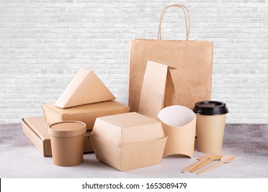 Recycling Concept. Delivery Food Background. Fast Food Eco Packaging On White Wall Background