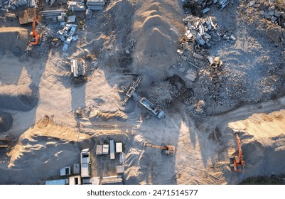 Recycling concrete and asphalt from demolition. Excavator at landfill load concrete waste. Disposal of Construction waste (CDW). Re-use concrete after demolition. Stone crushing site. recycled asphalt - Powered by Shutterstock