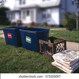 Recycling Day.  Household Trash Separated For Recycling Collection In A Suburban Neighborhood, Long Island, NY