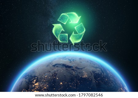 Recycling. Eco recycling green symbol. Recycling sign on the background of the globe