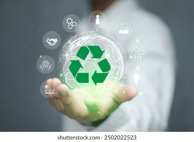 Recycling icon, Sustainable Development Concept.Man present glowing recycling, surrounded by various sustainability symbol, representing concepts of eco-friendly practices and sustainable development