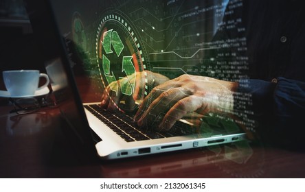 Recycling icon, waste data managment and sustainable industry symbol and man typing computer keyboard. Hands on laptop. Network, cyber technology and background abstract concept. - Shutterstock ID 2132061345