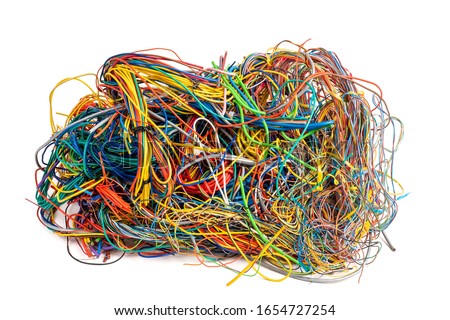 Recycling industry of non-ferrous metal pile of scrap copper electrical cable on white background