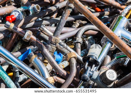 Recycling industry, a pile of old scrap metal ready for recycling