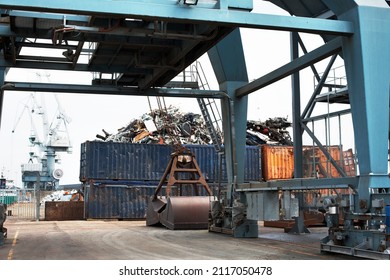 Recycling Metal. A Photo Of A Scrap Yard With Heaped Debris In Containers..