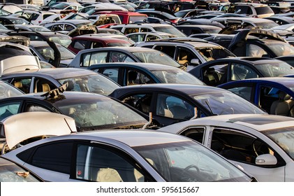 Recycling of old,used, wrecked cars. Dismantling for parts at scrap yards and sending for remelting.  - Shutterstock ID 595615667