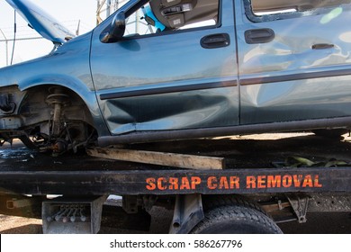 Recycling Scrap Car Removal Service For Future Dismantling And Metal And Parts Reuse.