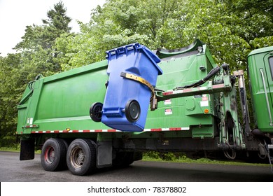 Recycling truck picking up bin - Horizontal