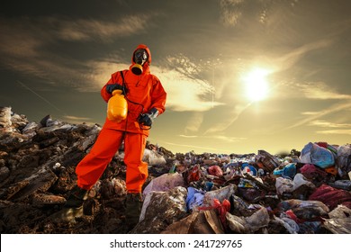 Recycling Worker Standing On The Landfill