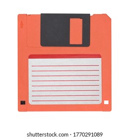 Red 3.5-inch floppy disk or diskette isolated on white background