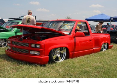 Red 90s Model Lowrider Chevrolet Truck