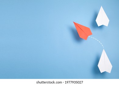 Red airplane changing direction. Think differently. Business. New idea. Creativity - Shutterstock ID 1977935027