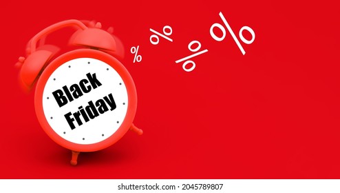 red alarm clock with the inscription Black Friday on a red background, the concept of sales and discounts