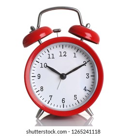 Red alarm clock isolated on white backgroundshows ten hours ten minutes of the morning time to get up to wake up and have breakfast morning or evening jog to go to work.