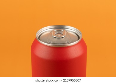 Red Aluminum Can Isolated On Orange Background