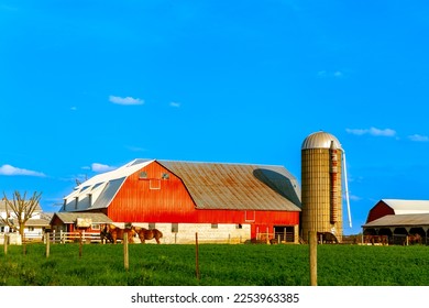 Red American Barn with Blue Sky - Shutterstock ID 2253963385