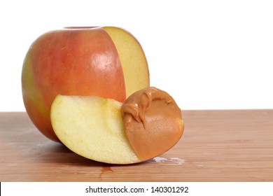 Red Apple With Cut Slice And Peanut Butter