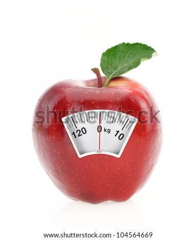 Red apple diet and weight loss scale concept