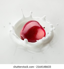 Red Apple Falls Into Milk, Yoghurt, Sour Cream, Splash