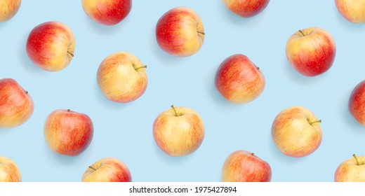 Red Apple Fruits Over Blue Seamless Backdrop Texture. Flat Lay Background