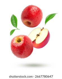 Red apple with half slice falling isolated on white background.