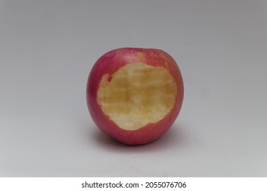 Red Apple With Human Bite Marks Like A World Famous Company Logo