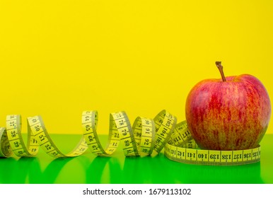 Red Apple With Measuring Tape