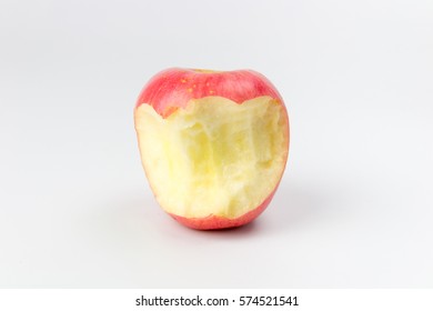 Red apple with missing a bite isolated on white background