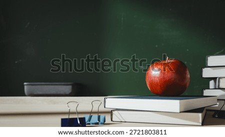 Red Apple on Stack of Books with School Blackboard Background. 3d rendering
