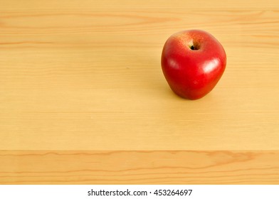Red Apple On The Table