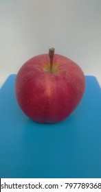 red apple on table