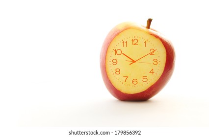 Red apple Slice Clock idea concept on the white background