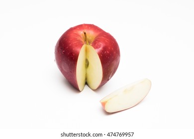 Red apple with slice isolated on white background - Shutterstock ID 474769957