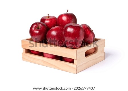 Red apple in wooden box (crate) isolated on white background with clipping path