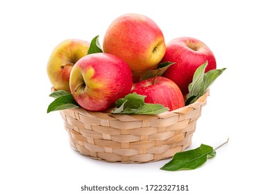 Red apples in a wicker basket. Isolate on a white background.