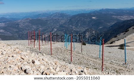 Red and Aqua poles making a pathway on Mont Ventoux