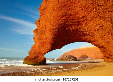 Red Archs On Atlantic Ocean Coast. Morocco, Africa