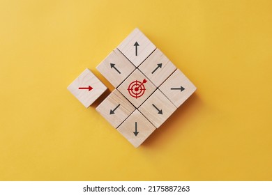 The red arrow moves towards the target. A symbol of purposeful movement towards the goal - Shutterstock ID 2175887263